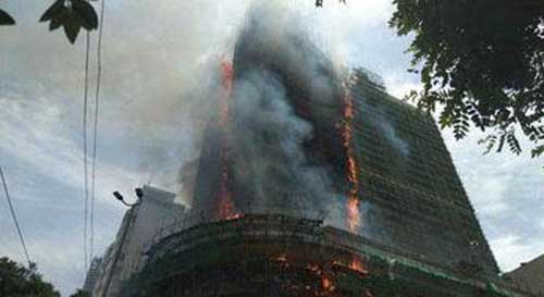 梦见对面高楼起火冒黑烟